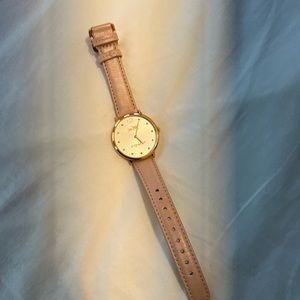 Light pink Coach wristwatch. Never been worn, great condition.